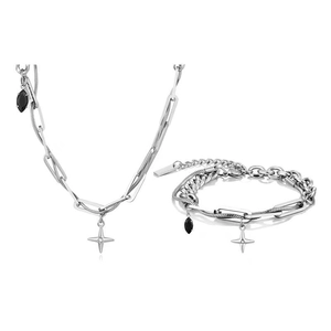 Detail of cross star jewelry set with titanium steel chains and black gemstone pendant