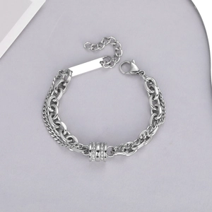 Double-layered titanium steel bracelet with a crystal-studded cylinder and cuban chain