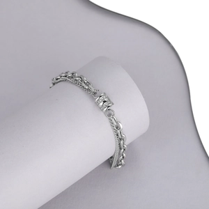 Detail view of double-layer titanium steel bracelet with sparkling cylinder charm