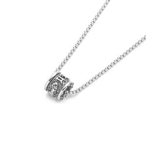 Detailed macro view of the silver vintage titanium steel necklace with Gemini charm