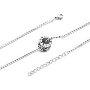 Detail view of titanium steel box chain with a cylindrical mantra barrel pendant