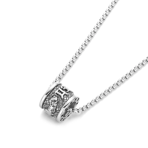Vintage titanium steel necklace featuring a rotating cylinder pendant with relief patterns