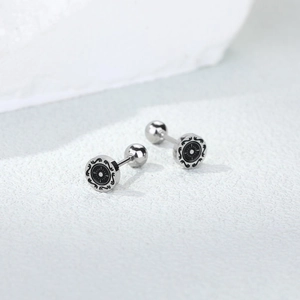 Vintage titanium steel ship rudder stud earrings with black enamel retro sun pattern