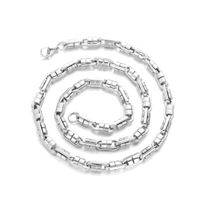 Detail view of silver industrial chain necklace with square links and lobster clasp