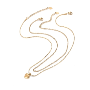Collier multicouche en acier titane doré avec pendentif cœur poli et chaînes superposées