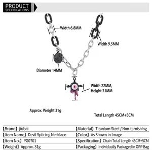 Collier Y2K Cœur Diable noir et argent avec pendentif œil rose accessoire tendance