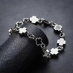 Titanium steel bracelet with black and white cross charms on a circular chain link