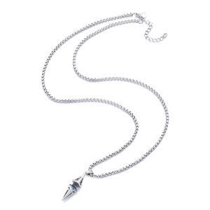Detailed macro view of geometric silver pendant with blue gemstone on square box chain