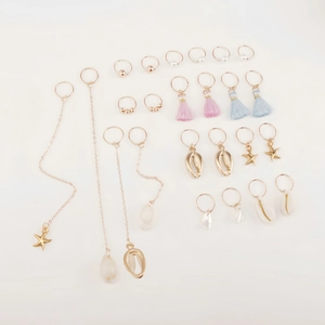 Set of 24 ocean style hair rings with golden starfish shells and colorful tassels