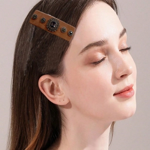 Retro brown leather hair clip with vintage metal studs and black gemstone for women
