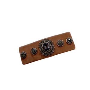 Vintage brown velvet hair clip with elegant emerald crystals and sparkling rhinestones