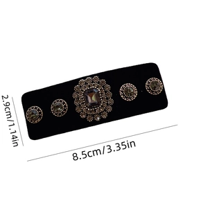 Detailed view of vintage velvet hair clip with rhinestone gems and dimensions info