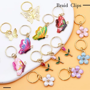 Détails de breloques colorées de papillons et fleurs pour accessoires de tresses
