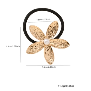Minimalist black elastic hair tie with a 5.3cm golden metal flower and faux pearl center