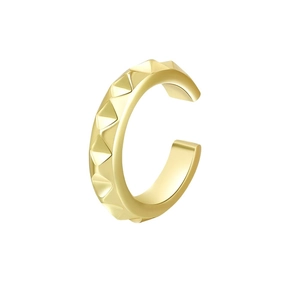 Close-up of golden C-shaped ear cuff featuring a polished finish and pyramid stud details