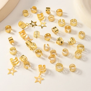 35-piece golden star and moon cuff set with hollow geometric designs for women