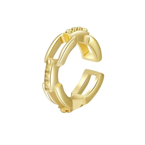 Detail view of golden double-layer hollow ear cuff with decorative steel beads