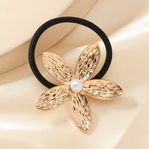 Minimalist gold flower hair tie with pearl center and high elastic black rope