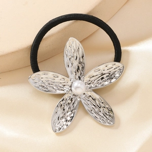 Minimalist five-petal silver flower hair tie with pearl center and hammered texture design