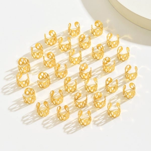 30pcs golden hollowed-out hair rings for African braids on a clean white background