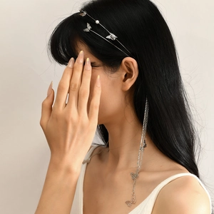 Elegant silver butterfly tassel headband with white pearls and sparkling rhinestones for women
