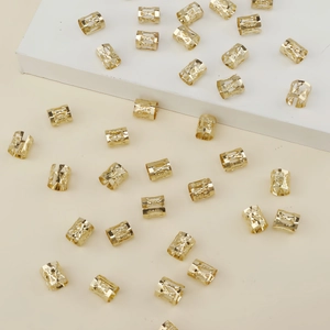40 pieces of golden hollow metal hair rings for dreadlocks with geometric filigree patterns