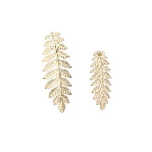 Elegant gold leaf hair clip set with intricate vein texture and pearl detail on white background