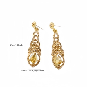 Detail view of gold tassel earrings with size 4.5cm and water drop crystal stone