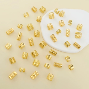 Set of 40 hollow golden metal hair rings for dreadlocks with bohemian texture