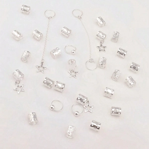 30-piece silver star hair ring set with textured cuffs and charms for braids