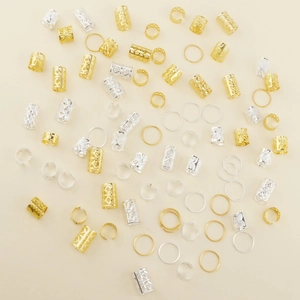 Detail of 80pcs gold and silver hollow metal hair rings and dreadlock cuffs for DIY styling