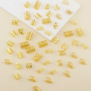 50pcs gold hair rings set featuring hollow cylinders and leaf charms for braids accessories