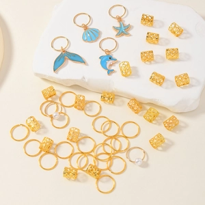 Set of 46 gold dreadlock hair rings with blue enamel charms and faux pearl accents