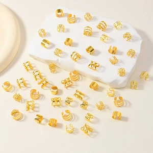 Set de 50 anneaux de cheveux dorés évidés et charmes de feuilles pour tresses DIY