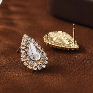 Boucles d'oreilles goutte d'eau scintillantes dorées avec pierres de zircon claires