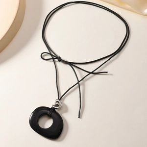 Minimalist black obsidian circle pendant necklace with adjustable cord for women
