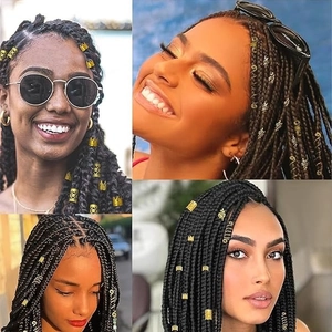 Detail view of 280-piece gold dreadlock accessories set on braided hairstyles