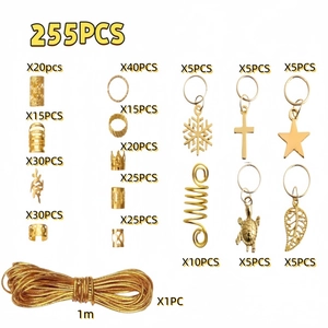 Macro detail of 255-piece golden dreadlock jewelry set with various charms and golden cord
