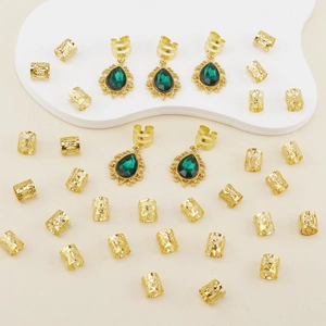 Bohemian gold hair ring set with emerald green teardrop pendants and textured cuffs