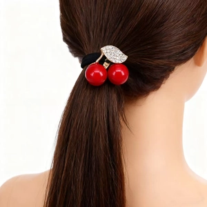 Élastique à cheveux cerise avec fruits rouges et strass brillants sur bandeau noir