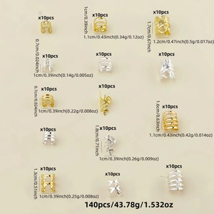 Lot de 140 bagues d'oreilles dorées et argentées avec divers designs géométriques