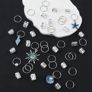 Set of 45 silver alloy hair braid rings with sea shell and starfish charms for women