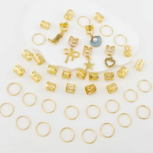 45-tlg. goldenes Haarschmuck-Set mit Schleifen- Herz- und Muschelanhängern aus Metall