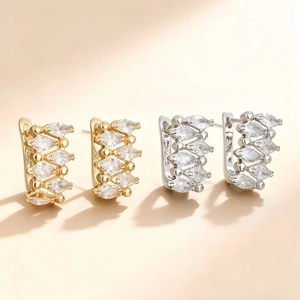 Elegant rose gold and silver hoop earrings featuring marquise-cut zircon stones