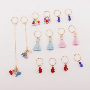 14-piece gold chain hair rings set with acrylic charms, colorful beads and silk tassels