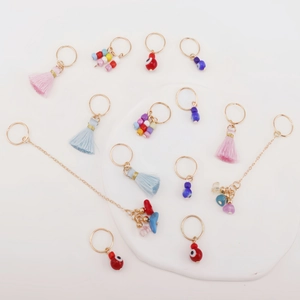 Bohemian style hair rings set with colorful tassels beads and evil eye charms decoration