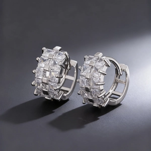 Silver hoop earrings with triple row square crystals and luxury minimalist metal finish
