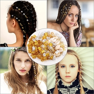Detailed set of 140 pieces gold and silver dreadlock hair cuffs with shells and leaf pendants