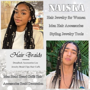 Macro detail of golden star hair cuffs and rings for braids decoration and beard styling