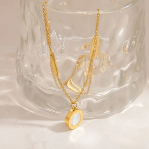 Double-layered 18K gold plated stainless steel necklace with Roman numeral shell pendant